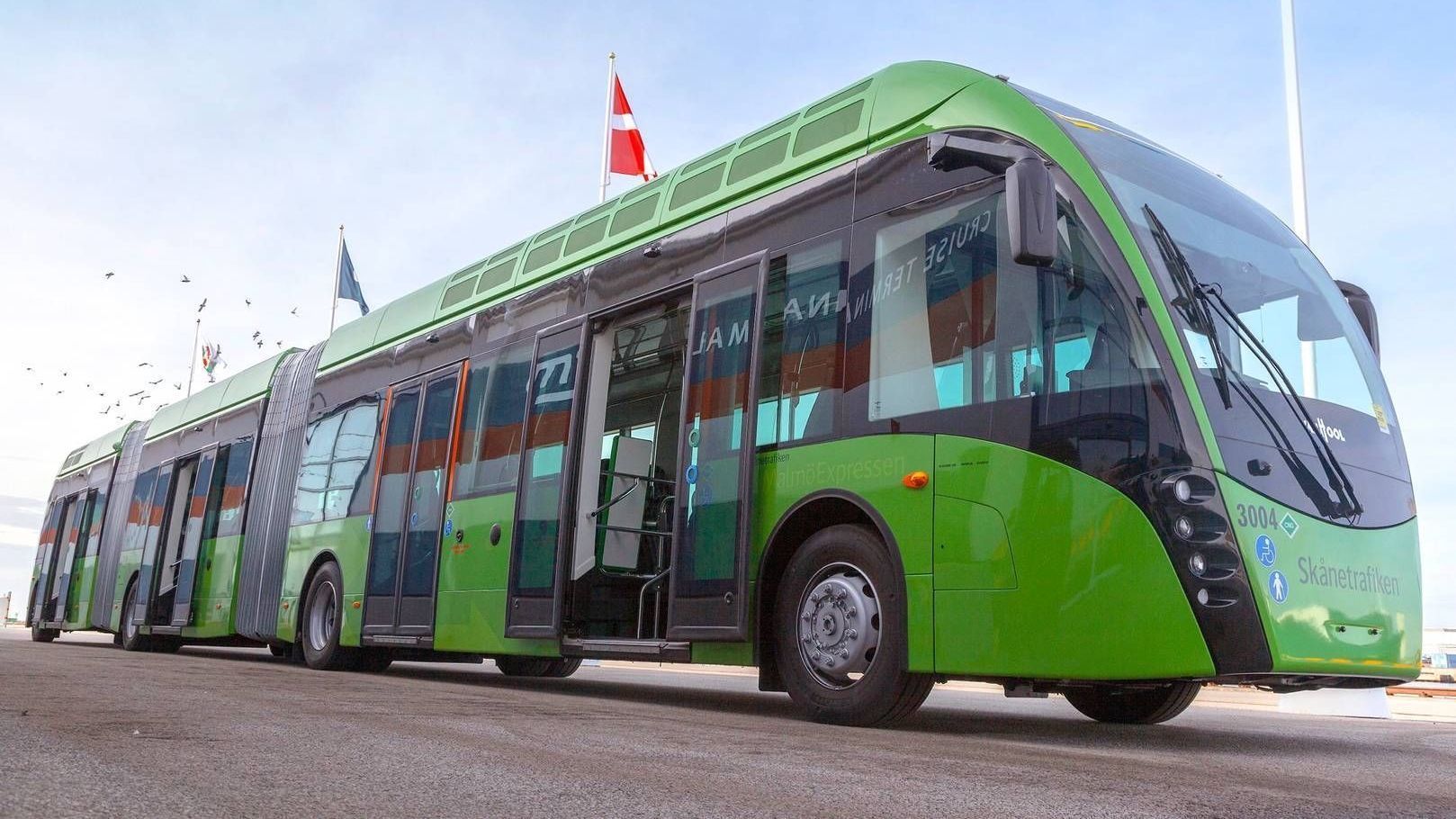 Использование общественного транспорта. Электробус van Hool. Автобус на биогазе. Современные автобусы. Автобус-гармошка.